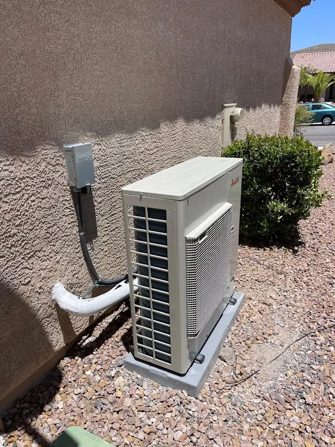 Residential air conditioning condenser unit in Rochester
